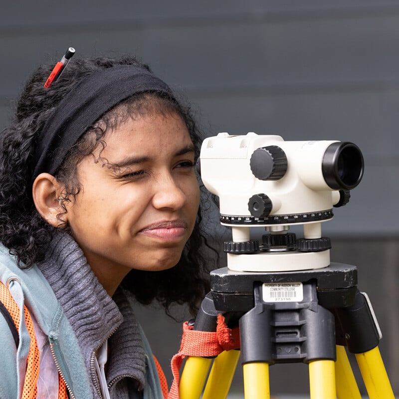 HVCC student surveying during class